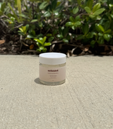 Melanated Beauty Spa Papaya & Pineapple Enzyme Mask jar on concrete outdoors