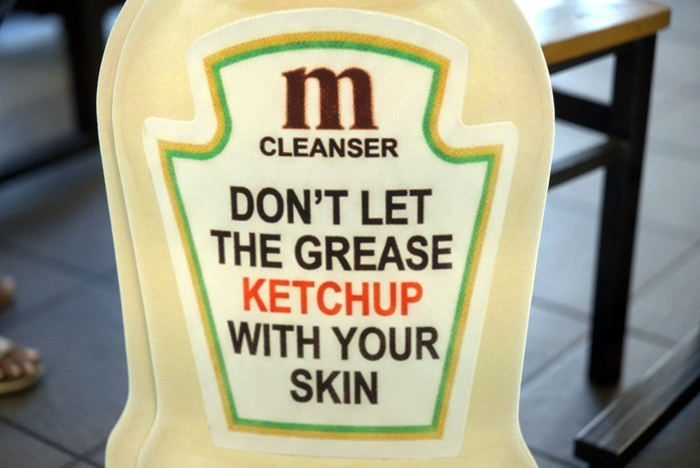 Cleanser bottle label: Don’t let the grease ketchup with your skin