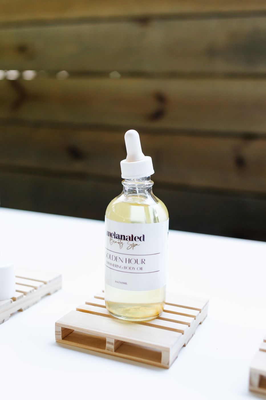 Golden Hour body oil on a mini pallet